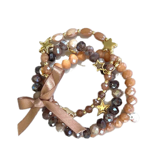 
                    
                      Armband dreifach beige braun gold Perlen Charms Sterne
                    
                  