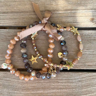 
                    
                      Armband dreifach beige braun gold Perlen Charms Sterne. f024e6ef 8f52 431e ae59 525b15aece5f
                    
                  