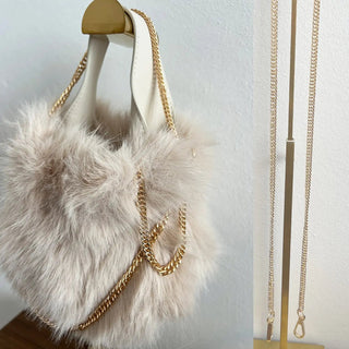 
                    
                      Mini Tasche Fell Fake Fur beige goldkette
                    
                  
