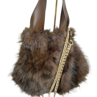 
                    
                      Mini Tasche Fell Fake Fur leo goldkette
                    
                  