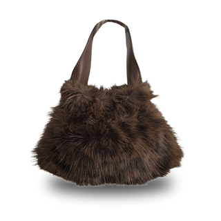 
                    
                      Mini Handtasche 'Kitzbühel' aus Fake Fur Fell Leo Muster mit Kunstledergriff
                    
                  