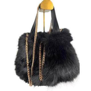 
                    
                      Mini Tasche Fell Fake Fur schwarz goldkette
                    
                  
