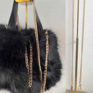 
                    
                      Mini Tasche Fell Fake Fur schwarz goldkette
                    
                  