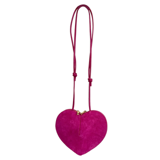 
                    
                      Herzl Tasche Velourleder pink neben brauner und blauer Tasche
                    
                  