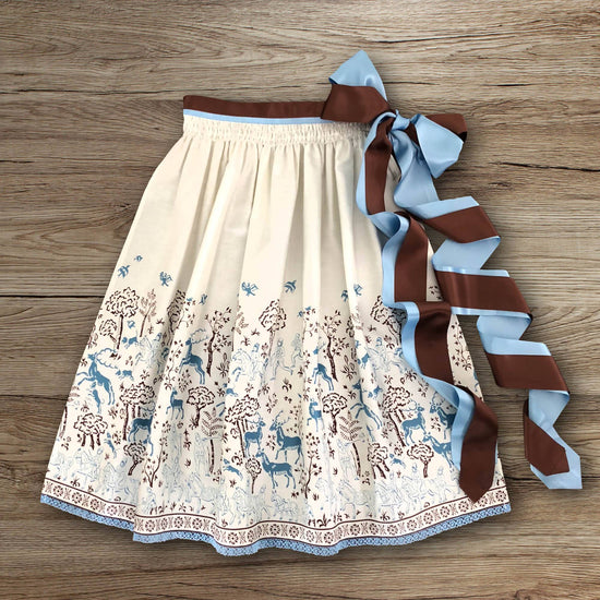 Dirndlschürze Midi cremeweiß Hirsche